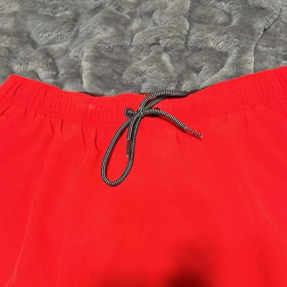 Nike  Red and Black Swim Trunks (Men's Size Medium)